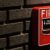 A-fire-alarm-call-point-box-on-a-brick-wall-178722659_1257x835-SM-TWT